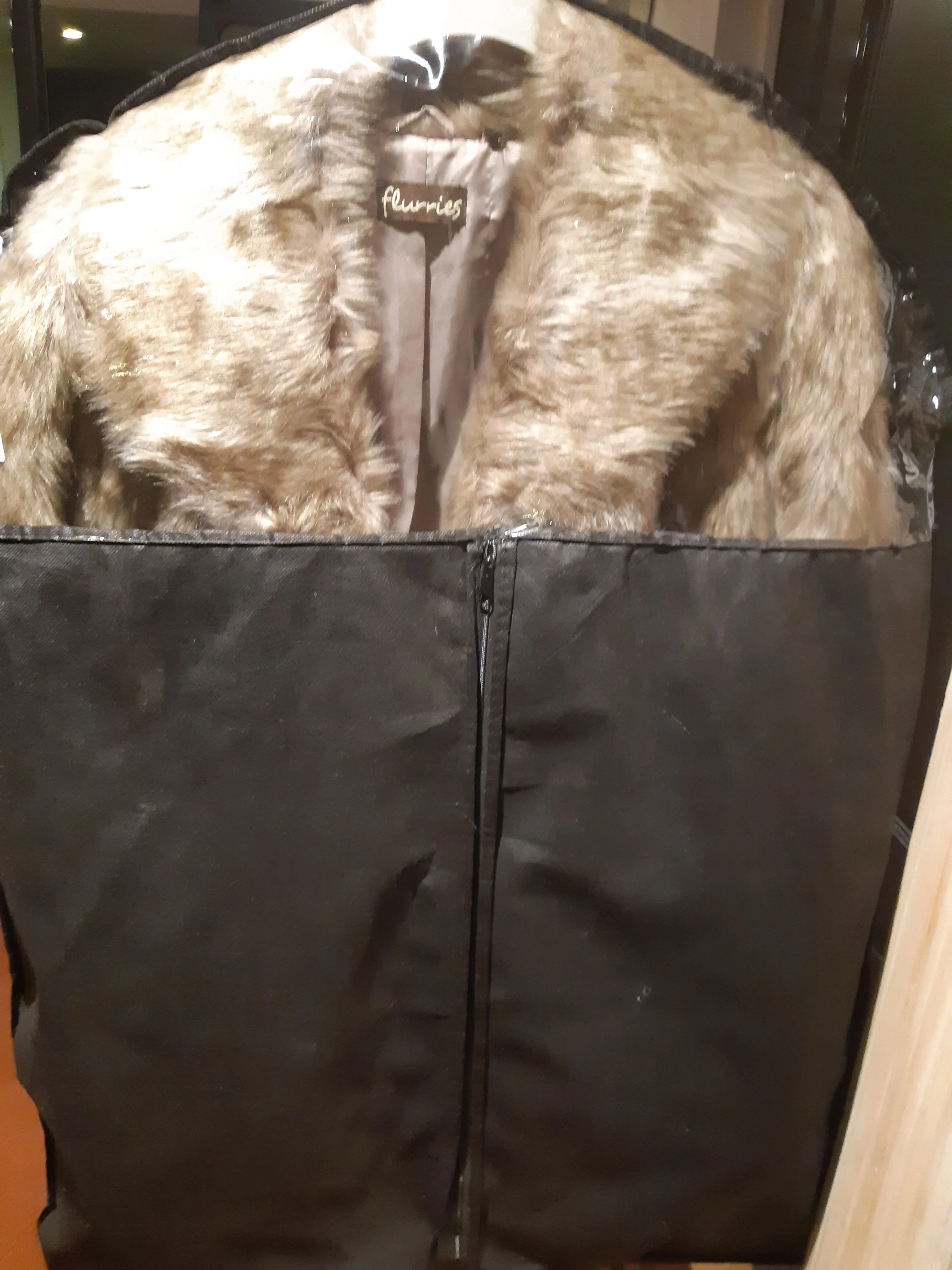 Flurries faux fur coat branded