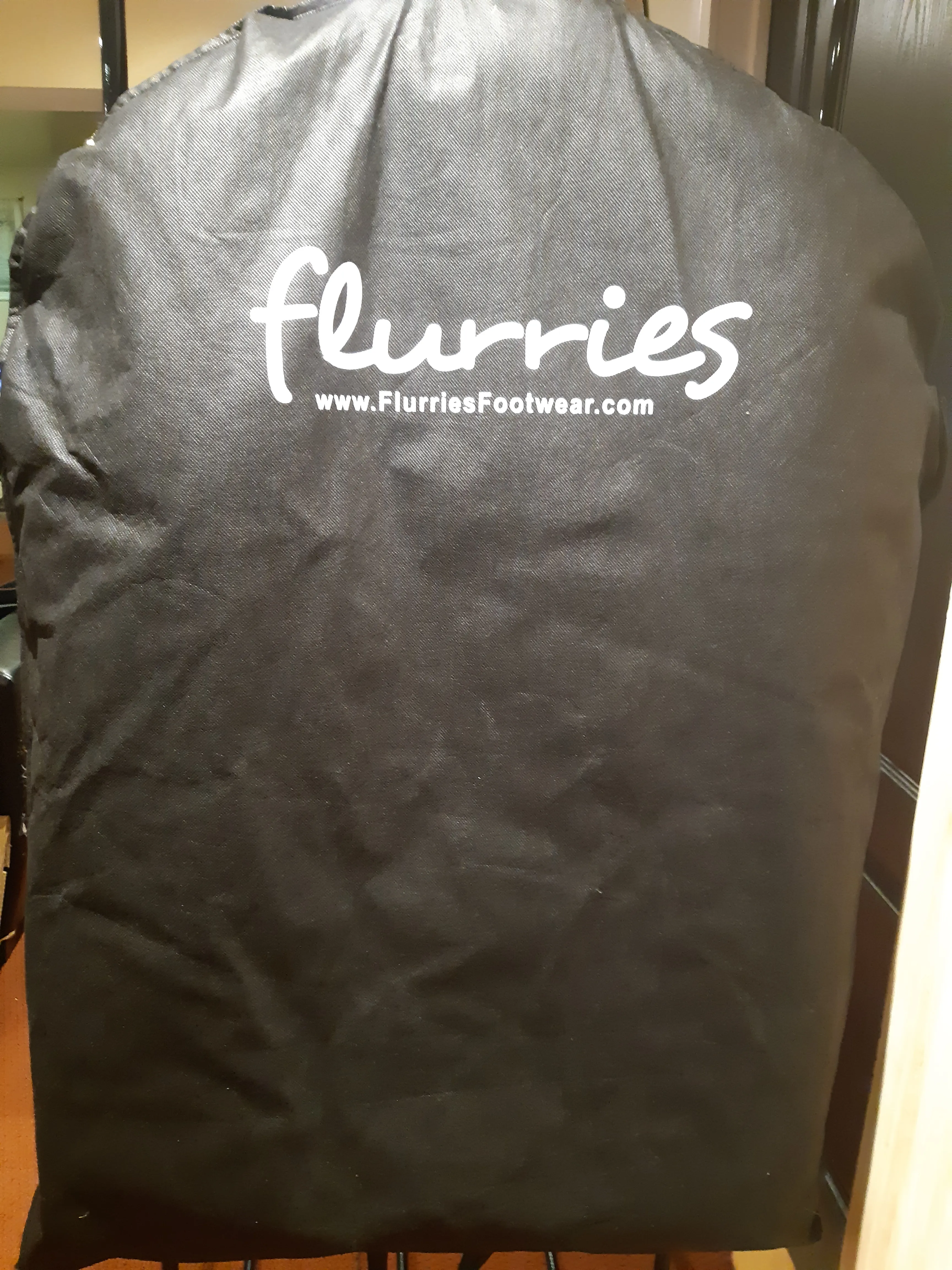 Flurries faux fur coat branded