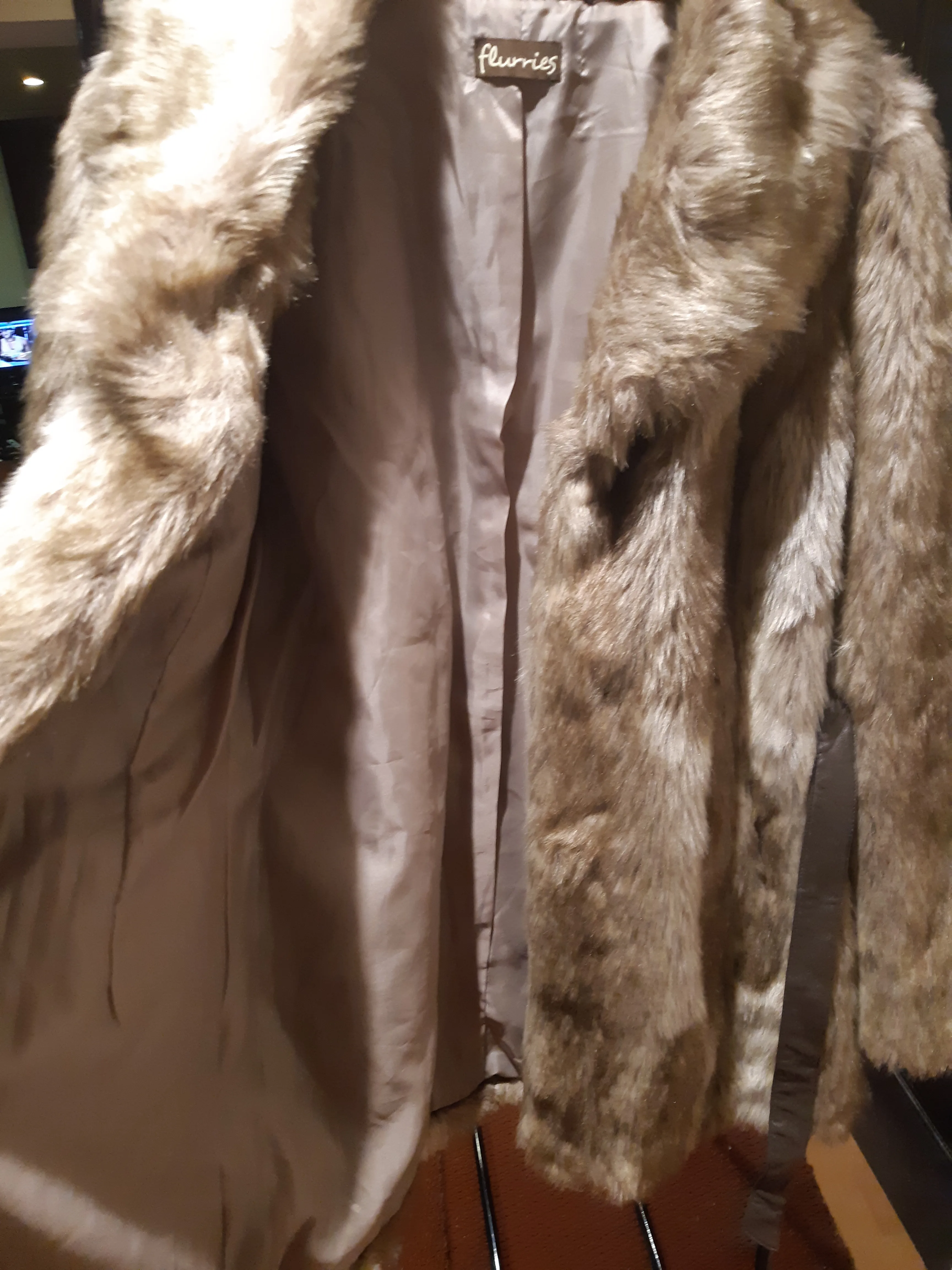 Flurries faux fur coat branded