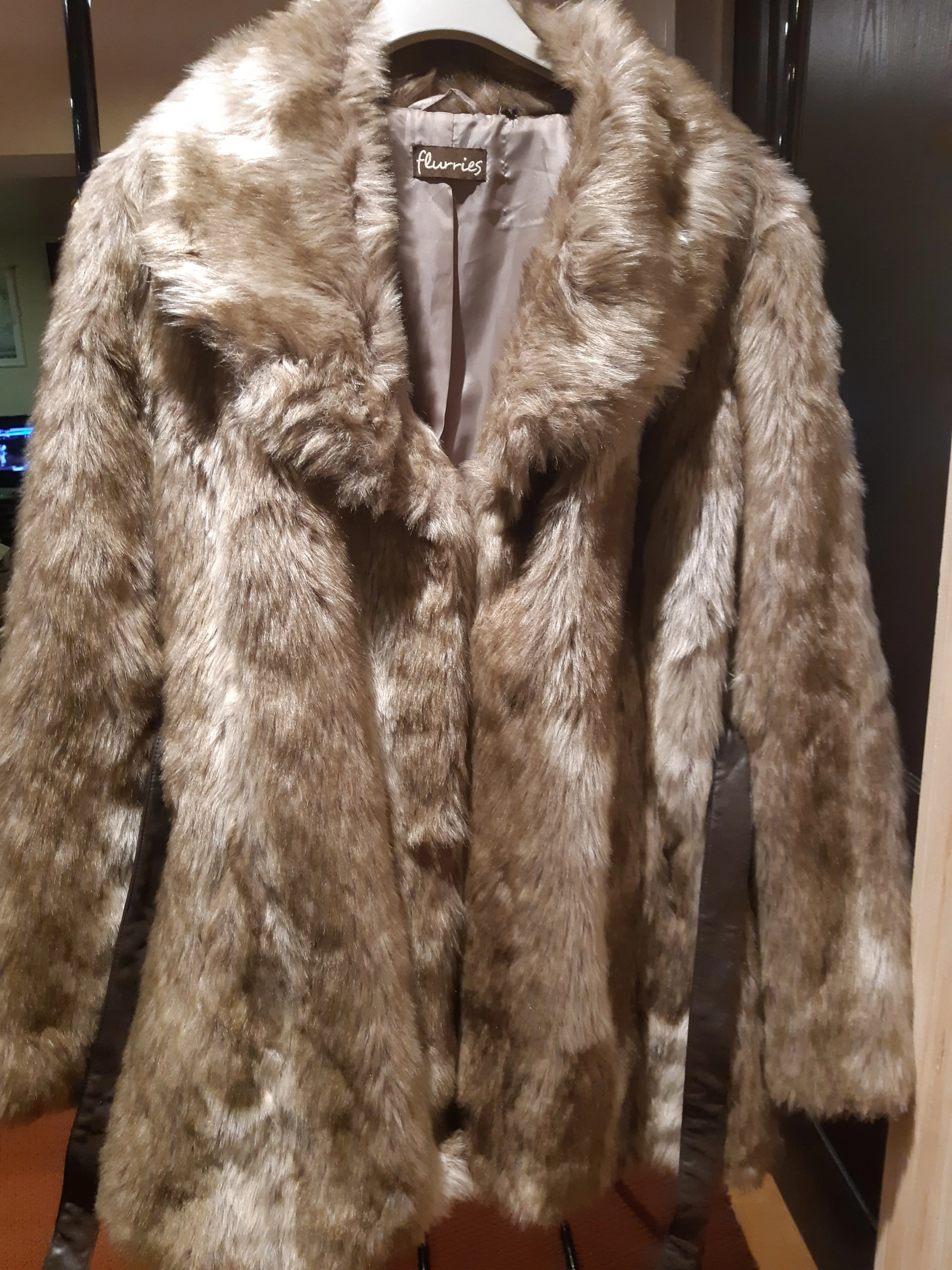 Flurries faux fur coat branded