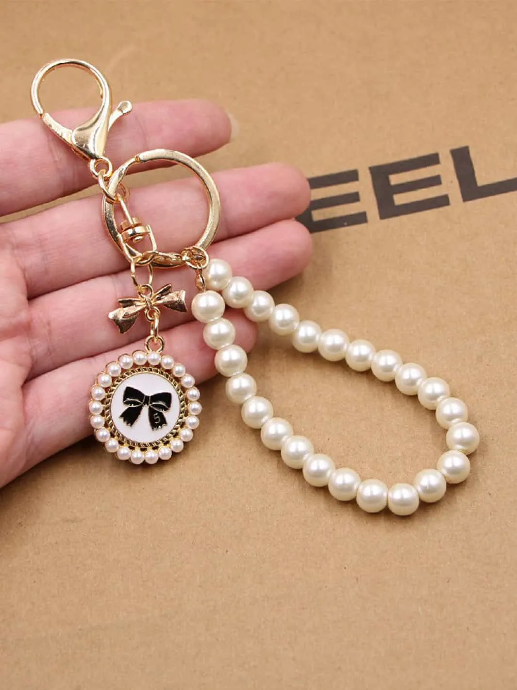 Vintage Bowknot Pearl Handstring Bag Keychain